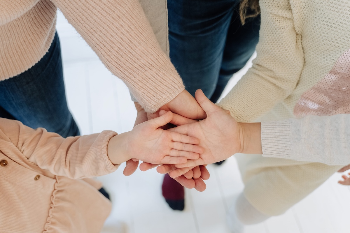 People Hold Hands Palm Up Together Unity Concept
